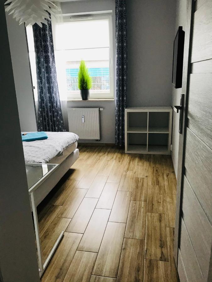 オルシュティンApartament Calamo Tuwima Parkアパートメント エクステリア 写真