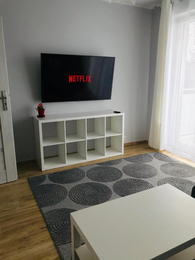 オルシュティンApartament Calamo Tuwima Parkアパートメント エクステリア 写真