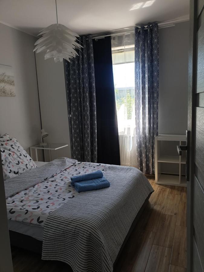 オルシュティンApartament Calamo Tuwima Parkアパートメント エクステリア 写真