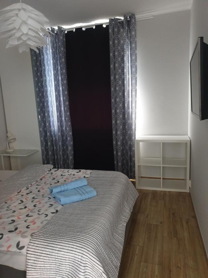 オルシュティンApartament Calamo Tuwima Parkアパートメント エクステリア 写真