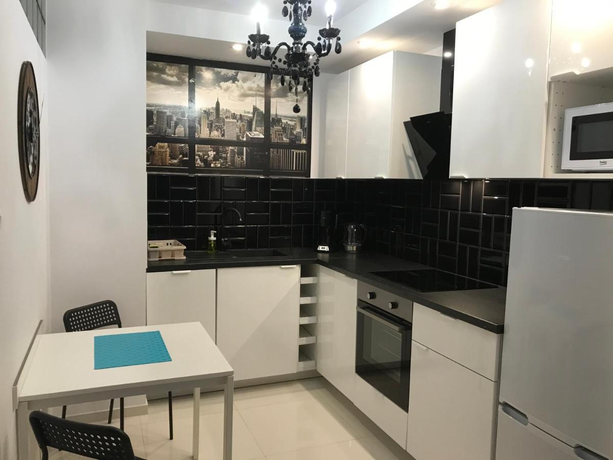 オルシュティンApartament Calamo Tuwima Parkアパートメント エクステリア 写真